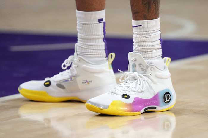View of D'Angelo Russell's white and yellow shoes.